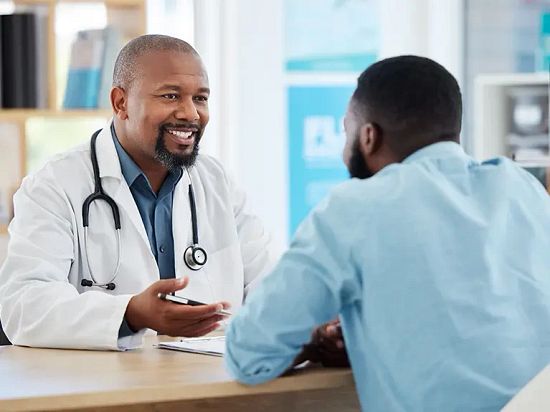 Doctors speaking with each other