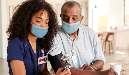 NYP Clinician with a patient