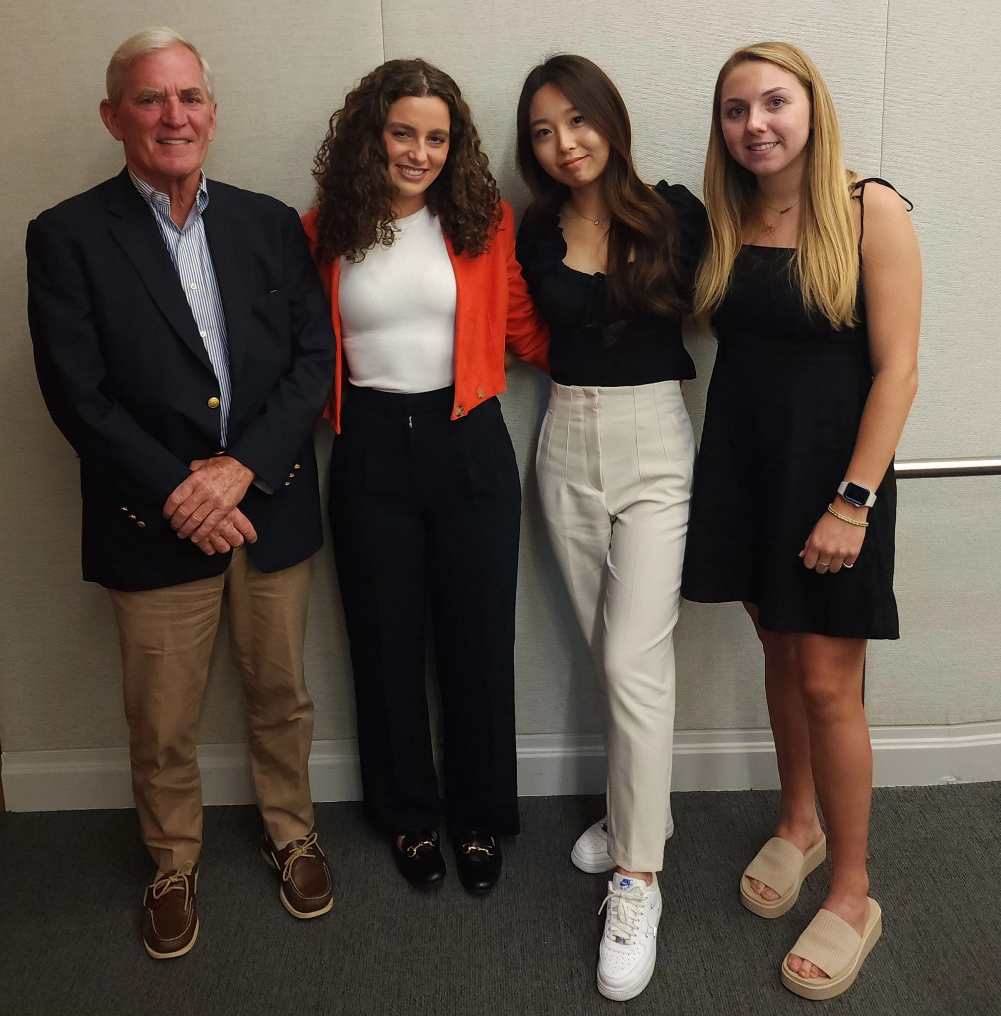 Fred Flynn with 2023 Flynn Fellowship graduates Sophia McDonald, Sally Gao, and Kaitlyn Mohr.