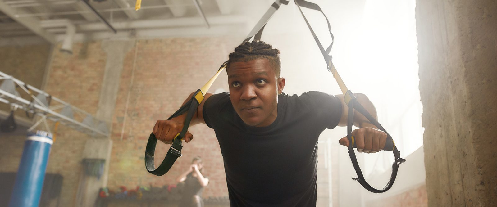 A teenager performing strength training.