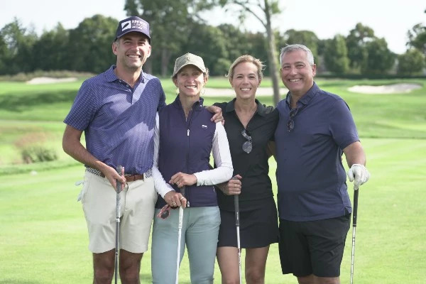 Lark and Dan Menchini with some friends at the 2024 NYP Community Hospitals Golf Outing
