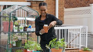 Letitia Thomas holding pottery