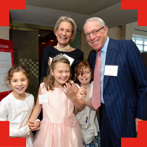 Smiling group of adults and children