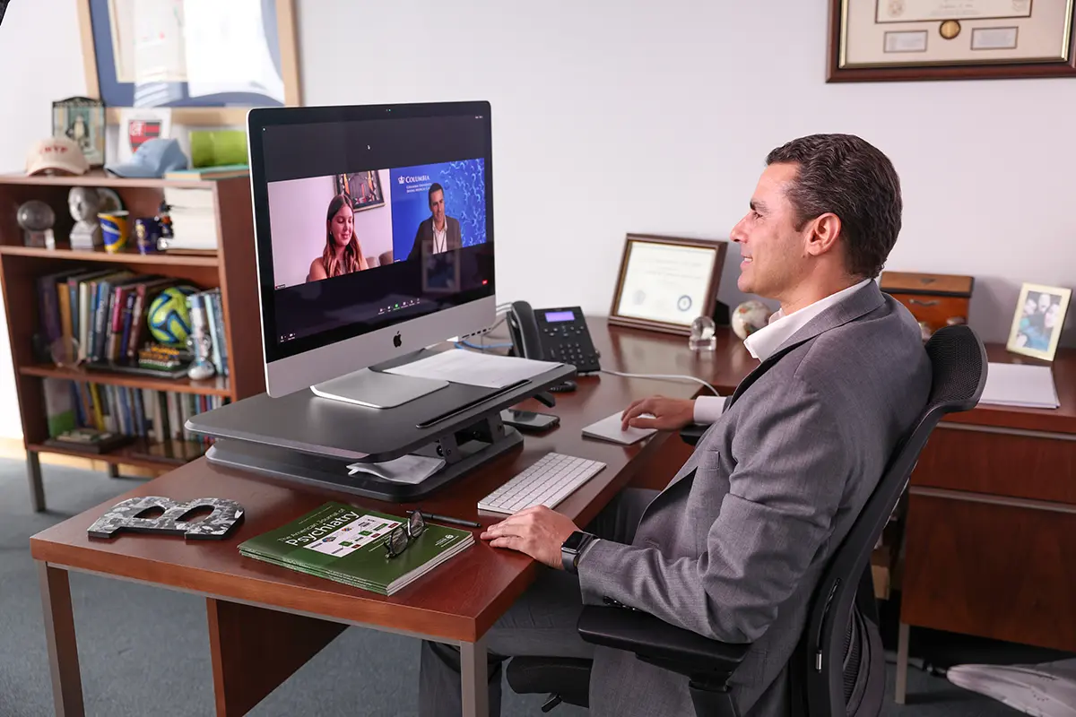 Dr Baptista on a zoom meeting