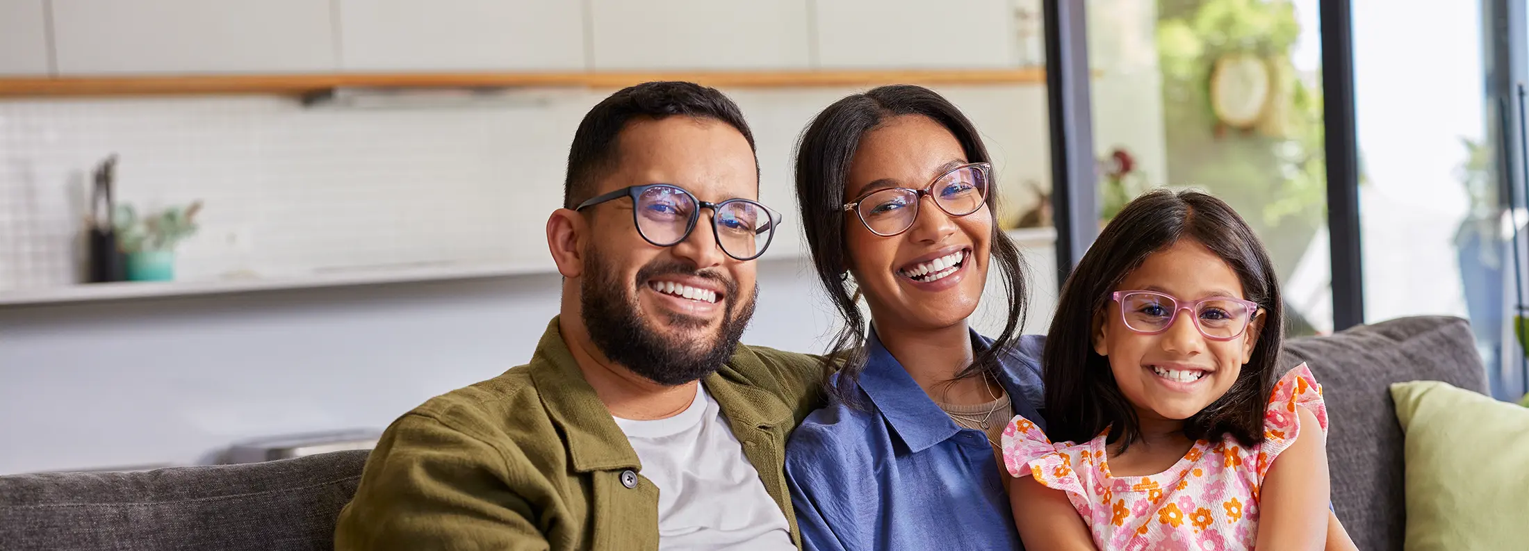 diverse family picture with all wearing glasses